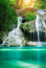 Beauty In Nature, Amazing Erawan Waterfall In Tropical Forest Of National Park, Thailand  