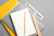 © Pixel-Shot - Stationery and paper with text SCHOOL TEST on grey background