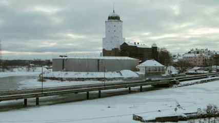 Wall Mural - panorama of Vyborg castle and Castle island in the early winter morning. Time lapse