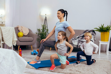 Nice active children sitting on one knee