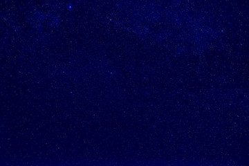 Wall Mural - night dark blue sky with many stars and milky way galaxy