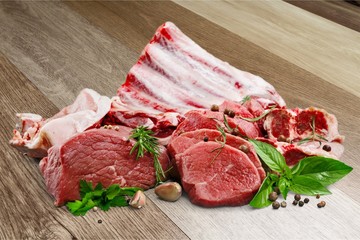 Wall Mural - Fresh Raw Meat on Background