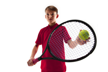 Wall Mural - Young teen boy tennis player in motion or movement isolated on white studio background. The sport, exercise, training concept