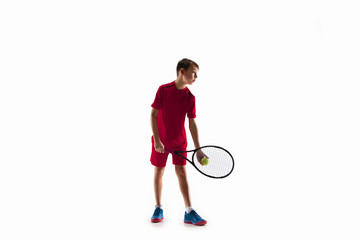 Wall Mural - Young teen boy tennis player in motion or movement isolated on white studio background. The sport, exercise, training concept