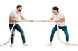 young men pulling rope and playing tug of war isolated on white