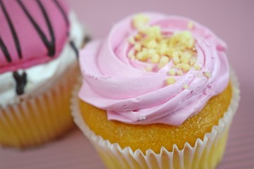 Wall Mural - Delicious cakes on wooden background.Sweet dessert for coffee.