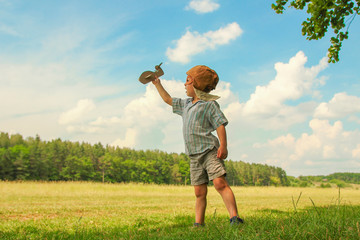  boy pilot with airplane