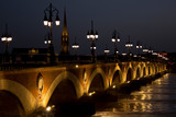 Fototapeta Paryż - Pont de pierre bridge at night in Bordeaux, France