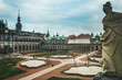 Dresdner Zwinger in Dresden with people,dramatic sky. Cityscape in Dresden. Travel and tourism in Dresden concept