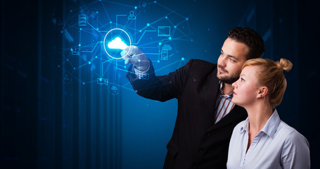 Poster - Man and woman touching hologram projection displaying cloud system 
