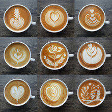 Collection Of Top View Of Latte Art Coffee Mugs On Timber Background.