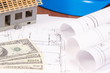 Electrical drawings, accessories for engineer jobs, house under construction and currencies dollar