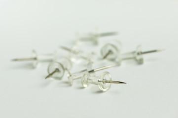 Pushpins on white. Pushpins. Office accessories