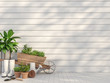 Outdoor terrace with garden equipment  3d render,There are empty white wood plank wall and floor,Sunlight shining to the wall with tree shadow.