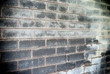 angled view of a gray brick wall background