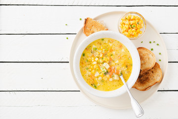 Wall Mural - Creamy corn soup with vegetables and meat. 