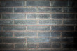 front on view of a gray brick wall backgound