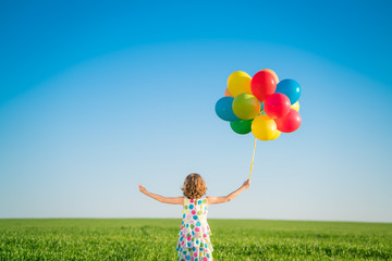 Sticker - Happy child playing outdoors in spring field