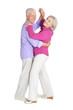 © aletia2011 - Portrait of happy senior couple dancing on white background