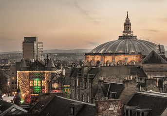 View of McEwan Hall's dome and Teviot House, of Edinburgh University, in the old town, from a roof top, with Christmas lights. Scotland, UK. Architecture. Student's Association