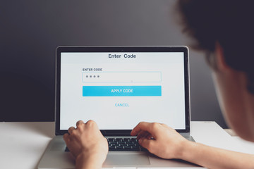 person enter security code on his device b