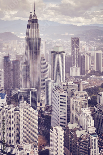Photo Kuala Lumpur skyline, color toned picture, Malaysia.