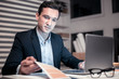 © Viacheslav Yakobchuk - Smart handsome businessman sitting at the laptop