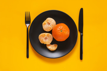 Poster - Tangerines in black plate on yellow