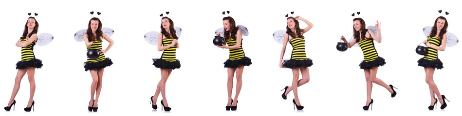 Young woman in bee costume isolated on white 