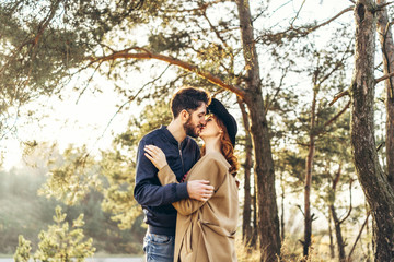 Happy young romantic couple spend time together outdoor.