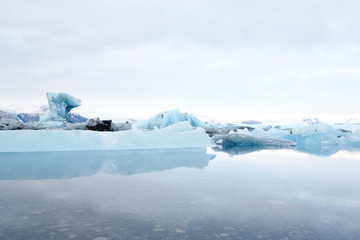 reflection of blue ice at jokulsarlon, iceland
