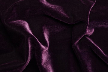 Beautiful luxury dark purple velvet texture background cloth.
