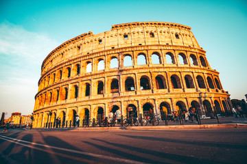 Fototapete - The ancient Colosseum in Rome at sunset