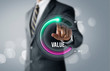 © Costello77 - Growth value, increase value, value added or business growth concept. Businessman is pulling up circle progress bar with the word VALUE on bright tone background.