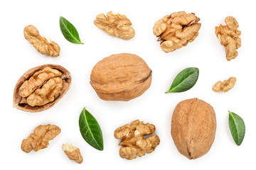 Walnuts with leaf isolated on white background. Top view. Flat lay