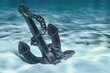 Anchor on ocean bottom underwater. 3D rendering