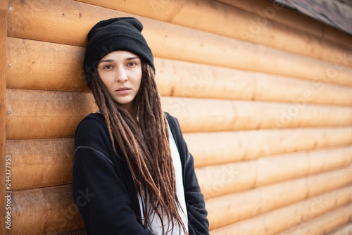 Beautiful Sexy Girl With Dreads In A Black Hat On A