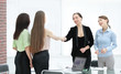 © yurolaitsalbert - Satisfied older woman and young manager handshaking after signing contract in office