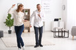 © Pixel-Shot - Beautiful couple dancing at home
