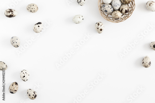 Cuadros en Lienzo Uncooked quail eggs on white background, protein diet, healthy food concept