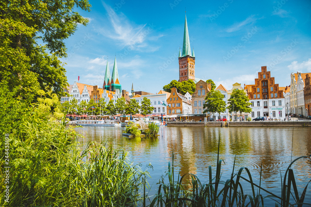 Historic city of Luebeck with Trave river in summer, Schleswig-Holstein, Germany - obrazy, fototapety, plakaty 