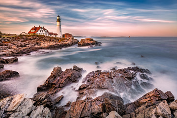 Portland Head light at dusk. The light station sits on a head of land at the entrance of the shipping channel into Portland Harbor. Completed in 1791, it is the oldest lighthouse in Maine