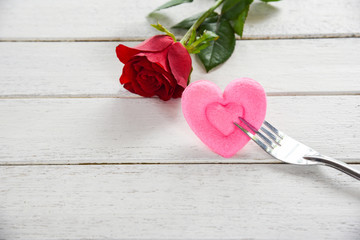 Wall Mural - Valentines dinner romantic love food and love cooking concept - Romantic table setting decorated with red rose flower