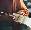© Rawpixel.com - Woman writing Content on a notepad