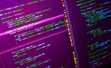 macro php code on pink background. web developing on the php language