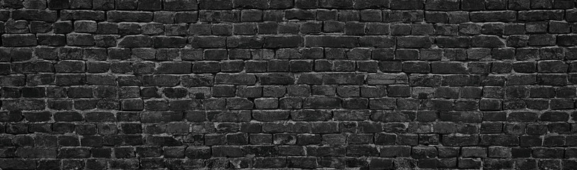 Wall Mural - panorama of black brick wall for site caps as background
