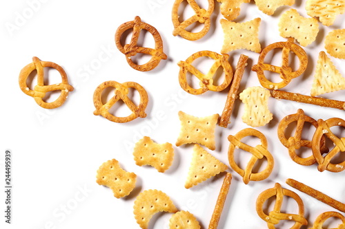 Cuadros en Lienzo Salty cracker pretzel party mix isolated on white background, top view