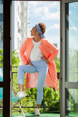 Canvas Print - African model woman in pink spring jacket and blue pants