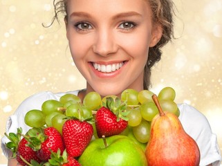 Canvas Print - Attractive caucasian smiling woman with salad  isolated