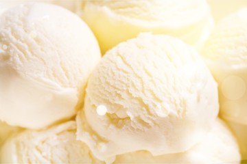 Ice cream vanilla dessert scoops delicious close-up isolated